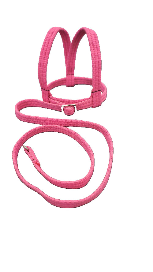 A pink woven fabric bird harness with stainless steel D-rings and adjustment buckles