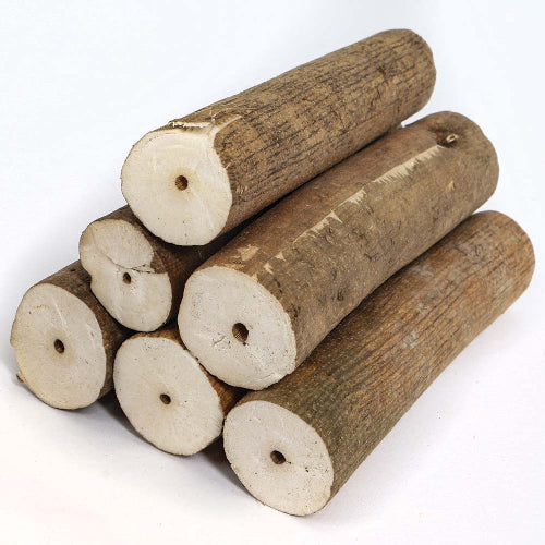 A stack of natural Sola wood log cut pieces